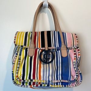 Juicy Couture colorful stripped bag. Multiple pockets inside and outside